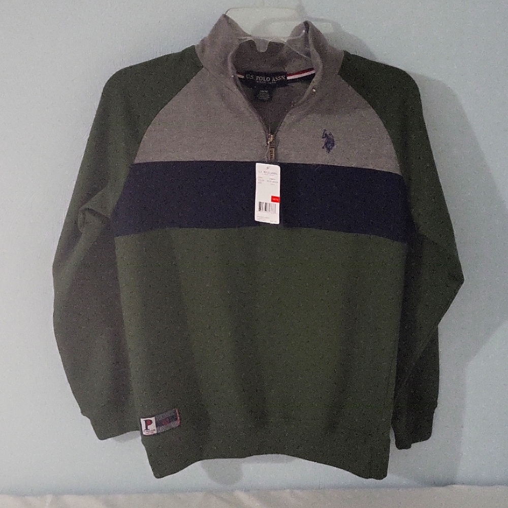 The brand is Polo and the size is 14/16